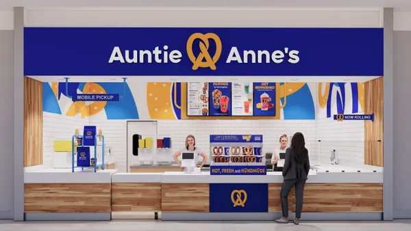 A rendering of a storefront with blue banner that says Auntie Anne's